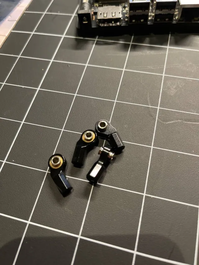 And finally, the ball rod ends for the steering link have… (photo)
