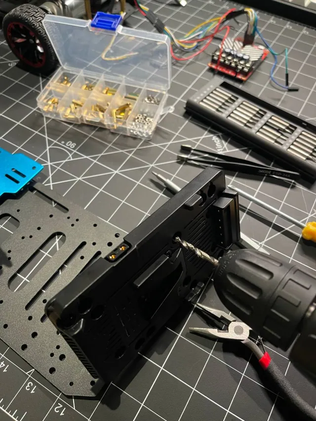 I got really lucky that the holes on the metal plate… (photo 1)